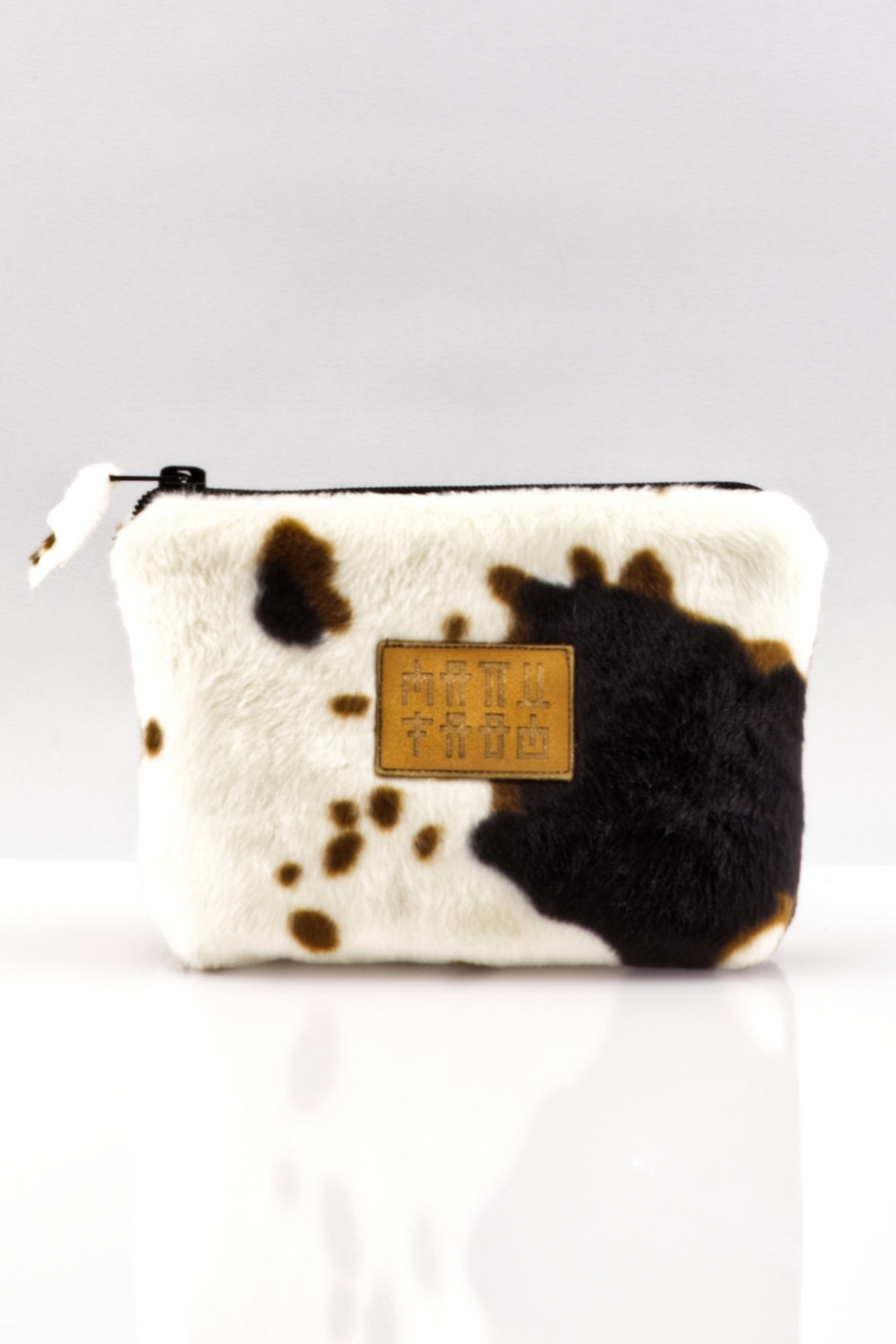 Manufabo Cosmetic Bag im Animal-Look mit Kuhfell-Muster